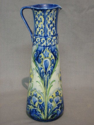 A Moorcroft Florianware pottery jug, the base with Moorcroft signature RD No. 347807, 8"