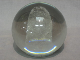 A large glass paperweight/door stop 5"