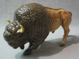 An Melba ware figure of a standing buffalo 13"