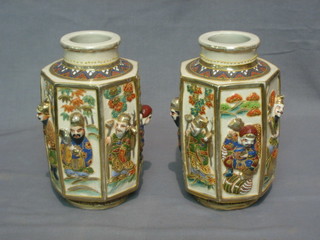 A pair of octagonal late Satsuma pottery vases decorated figures 10"
