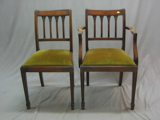 A set of 6 Regency style mahogany bar back dining chairs - 2 carvers, 4 standard