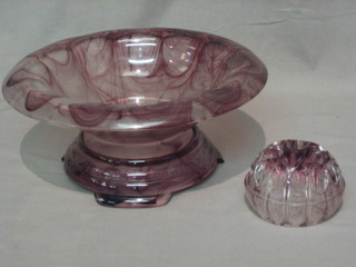 A circular Art Deco purple glass pedestal bowl 13"