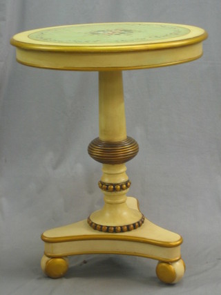 A 19th Century style circular cream and white painted occasional table with floral decoration, raised on a turned column with triform base, 24"