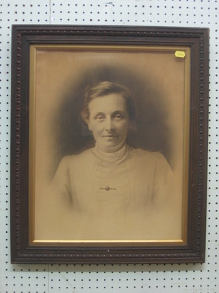 An early 19th Century black and white portrait of a lady 19" x 15" contained in an oak frame