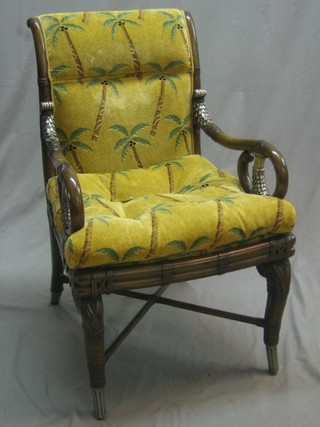A pair of Empire style open arm chairs, raised on cabriole supports with X framed stretchers