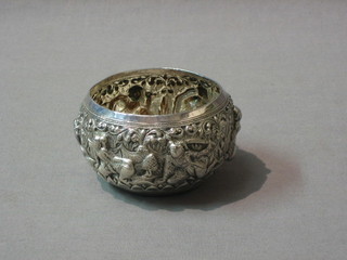 A circular embossed Eastern silver bowl decorated elephants and figures, 4 ozs, 3"