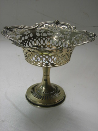 A circular pierced silver plated dish 4"