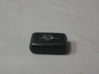 A Victorian rectangular lacquered snuff box with hinged lid 2"