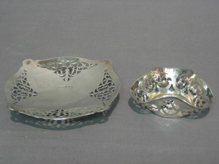 An Edwardian pierced shaped silver dish, Sheffield 1910 and a modern silver square dish with pierced decoration 3 ozs