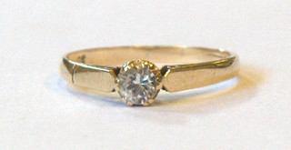 A lady's 9ct gold dress ring set a white stone