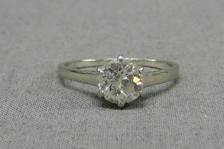 A lady's 14ct white gold dress/engagement ring, set an old brilliant cut solitaire diamond, approx 1.15ct