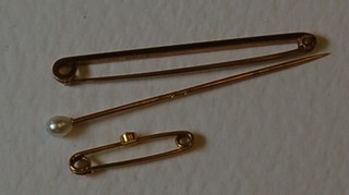 3 gold bar brooches and a gold pearl stick pin