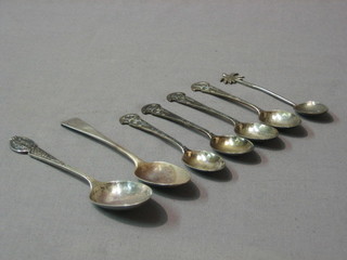 A Victorian silver Old English pattern teaspoon, an Eastern silver teaspoon, 4 silver teaspoons decorated crossed rifles and 1 silver other teaspoon, 4 ozs