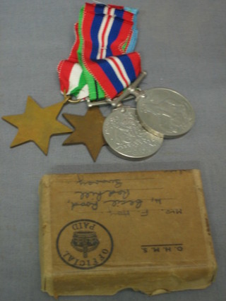 A Posthumous group of 4 medals comprising 1939-45 Star, Italy Star, Defence and War medal to Gunner Hoy with original presentation box