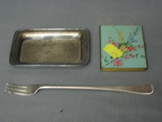 A rectangular silver pin tray Birmingham 1916, inscribed, a silver pickle fork, a rectangular gilt metal and enamel compact
