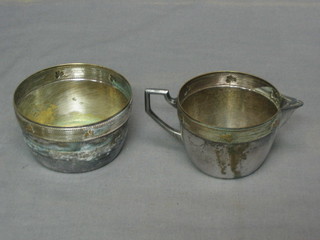 An Art Deco WMF cream jug and matching sugar bowl