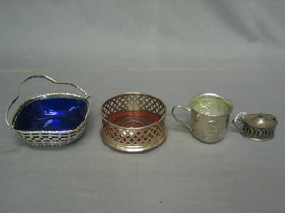 A silver plated christening tankard, do. basket with blue glass liner, a wine coaster and a mustard pot