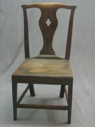 An 18th Century elm hall chair with slat back and solid seat