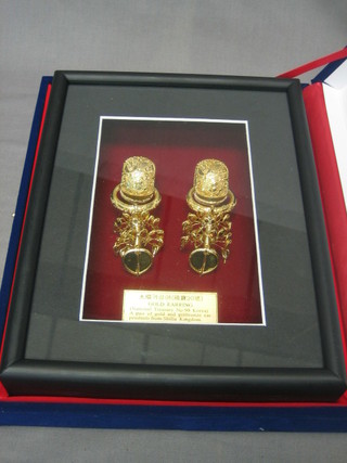 A pair of Eastern gilt metal earrings boxed