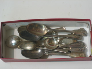 A collection of silver plated flatware