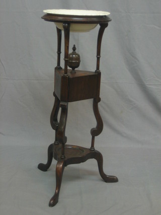 A 19th Century mahogany wig/wash stand fitted 2 drawers and with undertier, raised on cabriole supports