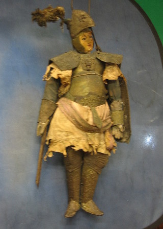 A figure of a standing warrior with armour and  articulated limbs  39"