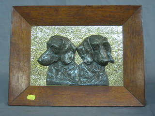 Morit, an embossed metal plaque depicting 2 Dachshunds contained in an oak frame 8" x 11"