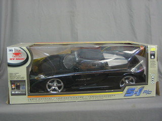 A Newbright Porsche Carrera GT  radio controlled car, 24" long with working lights 