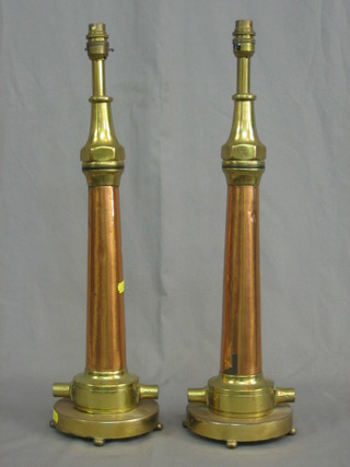 A pair of copper and brass fire hose nozzles, converted for use as electric table lamps by Mather & Platt 22"