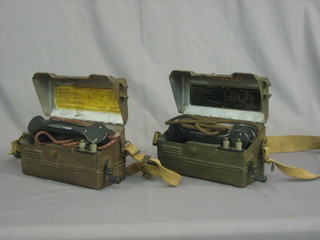 A pair of metal Military field telephones