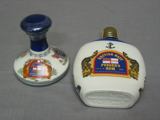 A Wade decanter containing Pursers Royal Navy Rum and 1 other (2)