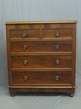 A Victorian walnut D shaped chest of 2 short and 3 long drawers with tore handles 43"