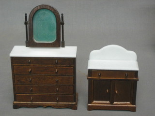 A dolls house Victorian style mahogany dressing chest with marble effect top, arched swing mirror, the base with 5 long drawers 3 1/2" together with a matching wash stand 3"