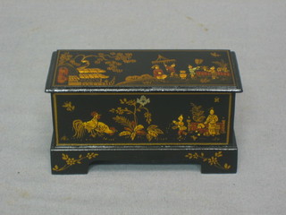 A dolls house black lacquered chinoiserie style coffer with hinged lid, raised on bracket feet 4" by Judith Dunger
