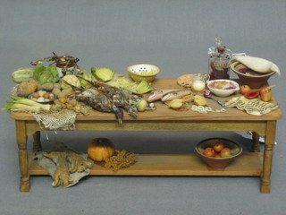 A dolls house Victorian style pine kitchen table, laid with game, fish and vegetables 8" by Janet Brownhill
