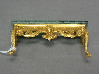 A dolls house gilt metal and onyx console table, raised on cabriole supports 4"