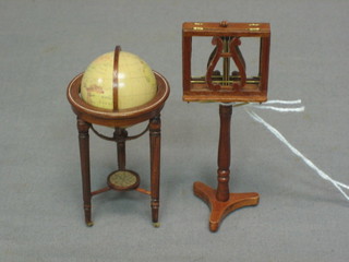 A dolls house William IV style mahogany duet stand together with a terrestrial globe