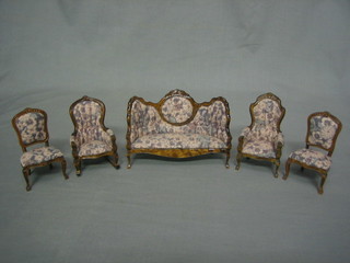 A dolls house 5 piece Victorian style drawing room suite comprising show frame spoon back settee, 2 standard chairs an  arm chair and a rocking chair
