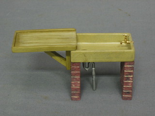 A dolls house butler's sink complete with draining board 5"