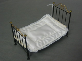 A dolls house Victorian style iron framed single bed 3"