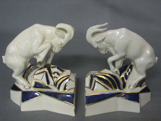 A pair of Art Deco style Royal Dux bookends in the form of rams, base with purple Royal Dux triangle mark and impressed 3090 6 1/2"