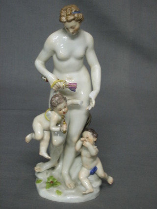 A "Meissen" porcelain figure of a standing classical lady with 2 cherubs, the base incised A65, 8" (f)