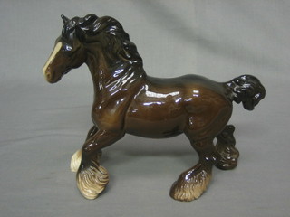 A Beswick figure of a bay shire horse with left hoof crooked, 8"