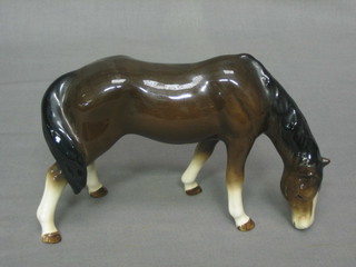 A Beswick figure of a standing grazing bay horse 4 1/2"