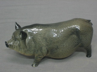 A Royal Doulton figure of a walking sow 6"