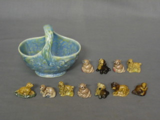 A Wade blue basket 5 1/2" containing 11 various Wade Whimsies