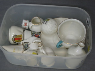 A Goss cup and saucer decorated the Arms of Leeds and a collection of crested china