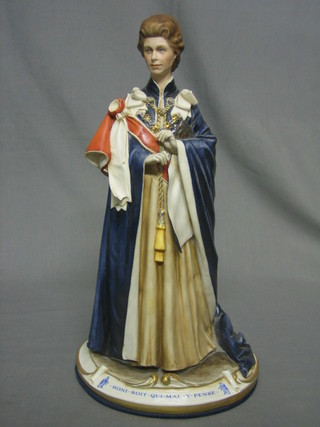 A Capo Di Monte figure of HM The Queen in the mantel of the Order of the Garter, reverse marked 1313, 14"