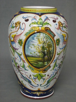 A 20th Century Majolica style vase decorated landscape, the base marked Cacf Faenza 9"