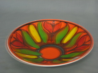 A circular Poole Pottery Atomic orange bowl 10" (cracked)